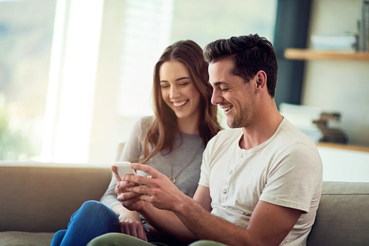 couple looking at laptop computer